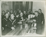 Service men being served drinks at bar