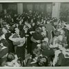Service men and hostesses dancing
