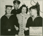 Ethel Merman with service men after performing at Stage Door Canteen (New York City).
