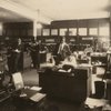 James Weldon Johnson standing at left and William Pickens (center) at Crisis office