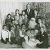 Yul Brynner (The King), Constance Carpenter (Anna Leonowens replacement) and children of The King and I at a Christmas party