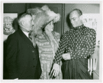 Yul Brynner (The King), right, with Bert and Beck Matthews, Pearly King and Queen, backstage at The King and I