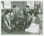 Yul Brynner (The King) with members of Hawaiian Youth Caravan of the Episcopal Church backstage at The King and I