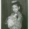 Carole Luna (Royal Child replacement) holding Somawadi the cat backstage at The King and I