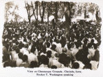 Booker T. Washington addressing a crowd at Chautauqua Grounds, Clarinda, Iowa.