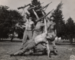 José Limón with three soldiers in rehearsal