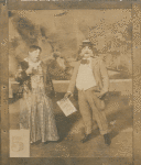 Unidentified actress and actor in a scene from The Passing Show of 1914.