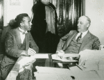 A. Philip Randolph speaking with the head of the Railroad Mediation Board