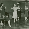 Agnes De Mille (director and choreographer), center, in rehearsal for Allegro