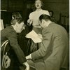 Ray Bolger (Sapiens), Constance Moore (Antiope) and Johnny Green (musical director) in rehearsal for By Jupiter