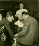 Ray Bolger (Sapiens), Constance Moore (Antiope) and Johnny Green (musical director) in rehearsal for By Jupiter