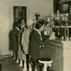 Customers seated at restaurant counter
