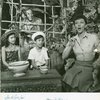 Barbara Luna (Ngana), Ezio Pinza (Emile de Becque), Michael or Noel DeLeon (Jerome) and Mary Martin (Nellie Forbush) in South Pacific