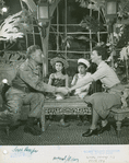 Ezio Pinza (Emile de Becque), Barbara Luna (Ngana), Michael or Noel DeLeon (Jerome) and Mary Martin (Nellie Forbush) in South Pacific