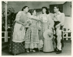 Betty Garde (Aunt Eller), Joan Roberts (Laurey), Jane Lawrence Smith (Gertie) and Alfred Drake (Curly) in Oklahoma!