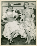 Joan Roberts (Laurey) and Celeste Holm (Ado Annie) backstage at Oklahoma!