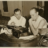 Ted Husing in T-shirt (right) with unidentified man
