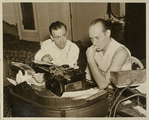 Ted Husing in T-shirt (right) with unidentified man