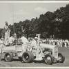 Ted Husing, his assistant Jimmy Dolan and the Columbia technical crew broadcasting from a specially designed truck for golf course work