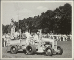 Ted Husing, his assistant Jimmy Dolan and the Columbia technical crew broadcasting from a specially designed truck for golf course work