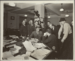 As a spellbound audience watched, Ted Husing, CBS announcer, is shown here broadcasting an eyewitness account of tragic Hindenburg disaster shortly after it happened