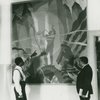 Artist Aaron Douglas (left) and Schomburg Collection curator Arthur A. Schomburg in front of Douglas's painting "Aspects of Negro Life: Song of the Towers".