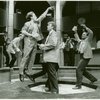 Burt Caesar, Paul Moriarty, Scott Cherry, and Daniel Webb in the stage production Serious Money.