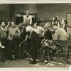 Ray Yates, Al Watts, Carrington Lewis, Alonzo Fenderson, Rex Ingram, Georgette Harvey, Leigh Whipper, Jack Carter, and Edna Thomas in a scene from the Theatre Union production of "Stevedore," at the Civic Repertory Theatre, New York