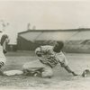 Jackie Robinson sliding into home as a member of the Montreal Royals, the Brooklyn Dodgers farm club