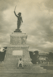 At the foot of Dessaline's statue in Port-au-Prince, Haiti