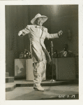 Cab Calloway wearing zoot suit in a musical performance from the 1943 motion picture "Stormy Weather"