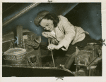 Mrs. Peggy Hargett of Pioneer Auto Repair, working on an automobile
