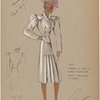 Suit jacket is cut to curve over hips.