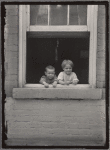 Two children in a window, Pittsburgh