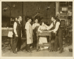 Five unidentified actors in scene from The Fourth Estate