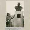 Mrs. A. Jacques Garvey viewing the bust of Marcus Garvey