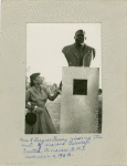 Mrs. A. Jacques Garvey viewing the bust of Marcus Garvey