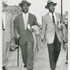 Rev. Ralph Abernathy and Rev. Martin Luther King, Jr., leaving the Montgomery, Alabama, County Courthouse