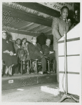 Paul Robeson at a podium, delivering a speech
