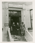 Amy Ashwood Garvey with two unidentified women on the steps of the Afro Women's Centre