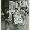 Daisy Bates takes a walk - Activist Daisy Bates picketing with placard