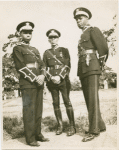 Three Universal African Legion officers: Lt. J. Harris, Major T. Wallace and Lt. I. Dinzey.