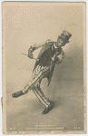 Le Cake-Walk."Danse au Nouveau Cirque, LES NEGRES." Photo postcard of man dancing with top hat and cane.