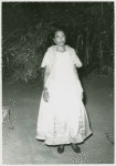 Full-length candid portrait of a woman