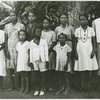 Candid portrait of ten people, women and children