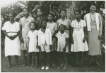 Candid portrait of ten people, women and children