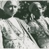 Close-up of two younger priestesses