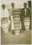 Candid portrait of three drummers, Bahia, Brazil