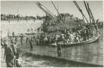 View of individuals in a vessel at sea