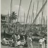 View of men and women on the docks